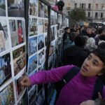 Un mural monumental homenajea a Charly García en la esquina de Corrientes y Callao